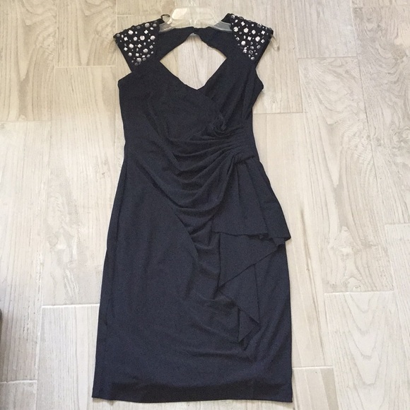 Maggy London Dresses & Skirts - Maggy London-elegant and flattering dress